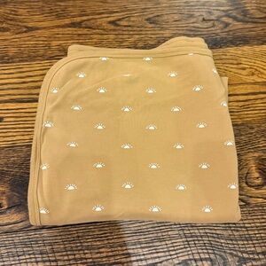 Quincy Mae baby swaddle, suns, sun print swaddle, boho swaddle, mustard yellow